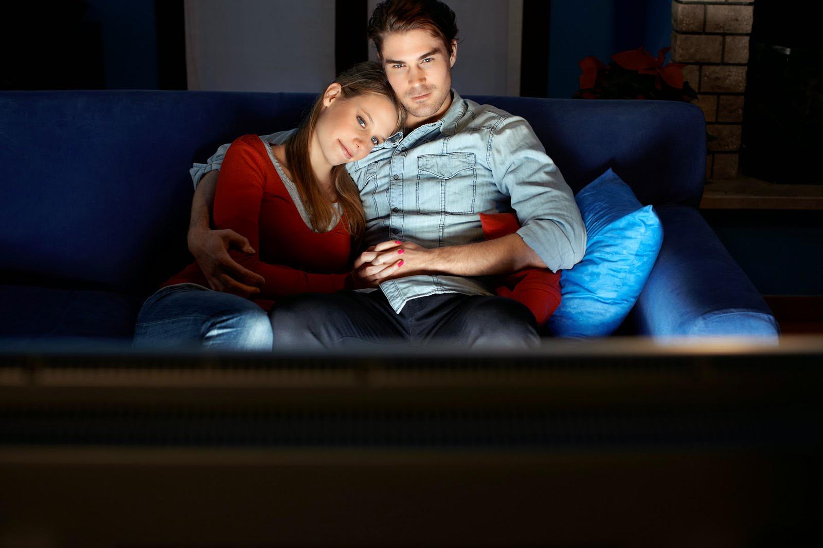 Man-And-Woman-Watching-Movie